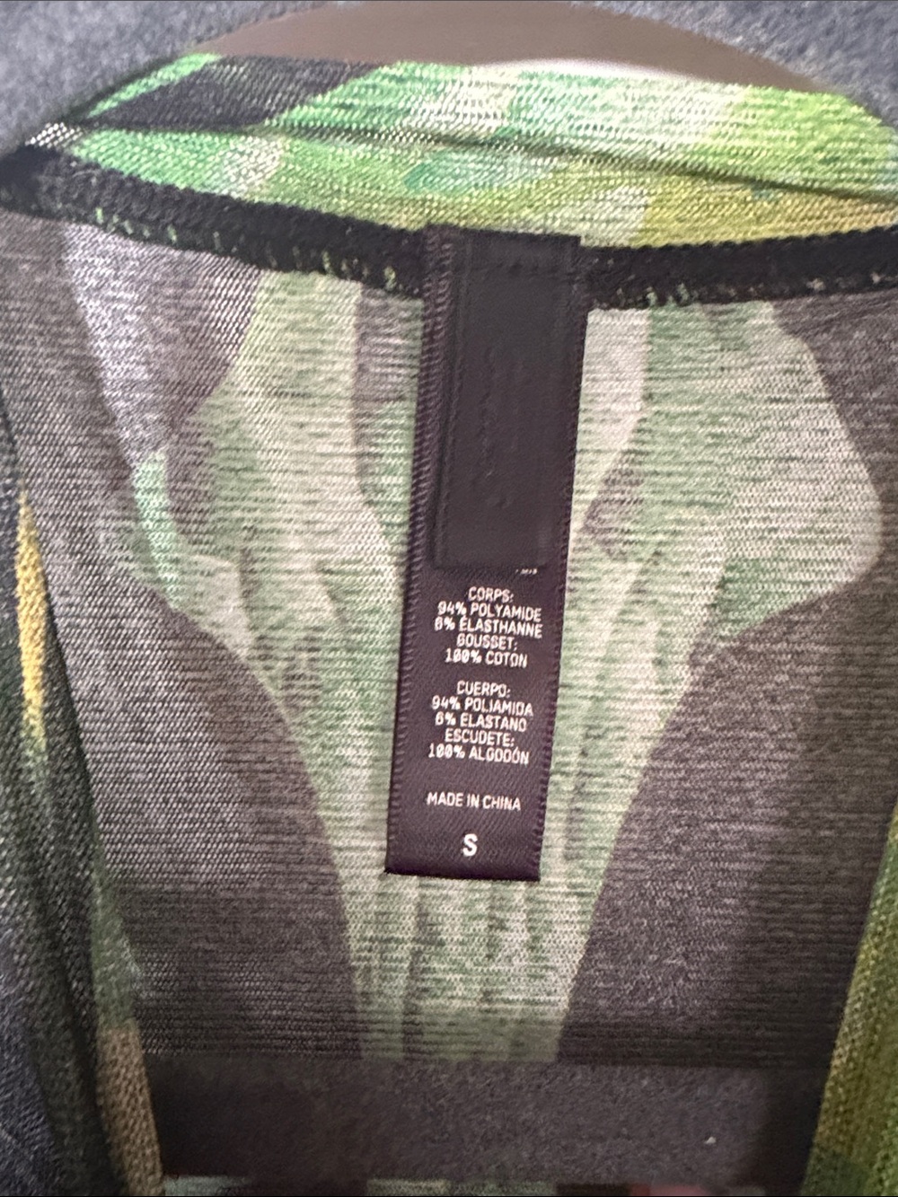 SKIMS Abstract Printed Short Sleeve Bodysuit in Black and Green - Picture 2 of 3
